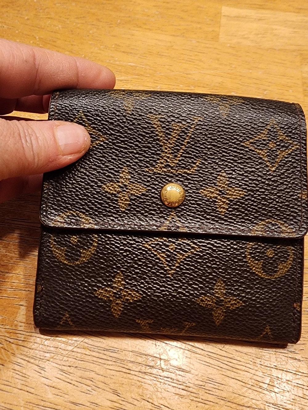 Louis Vuitton Monogram Elise compact wallet. 